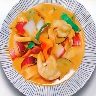 Langostinos Con Curry Rojo