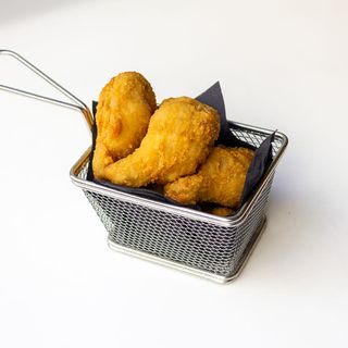 Ración Muslo Empanado Crujiente (300 G.)