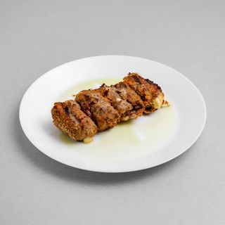 Involtino di vitello ripieno con prosciutto e formaggio piatto