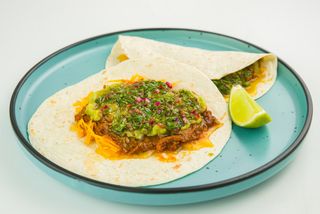 Soft shell pulled pork tacos