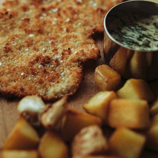 Milanesa pollo con guarnicion