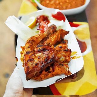 Half grilled chicken combo with fries and 2 free drinks