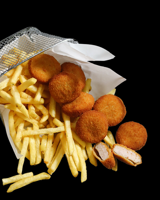 Nuggetsi + sok po želji