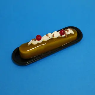 Eclaire pistacchio e gocce di cioccolato