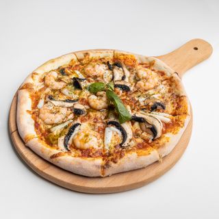 1 Pizza + 1 Soda au choix