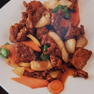 Plato De Ternera Con Salsa Picante