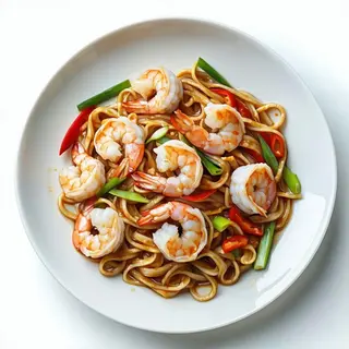 Udon saltati con gamberi