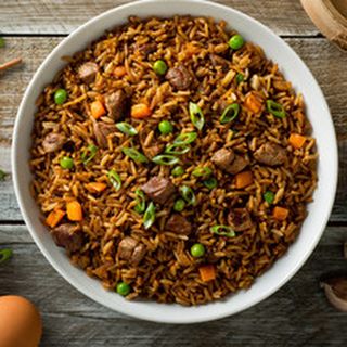 Пържен ориз с телешко месо (500г)