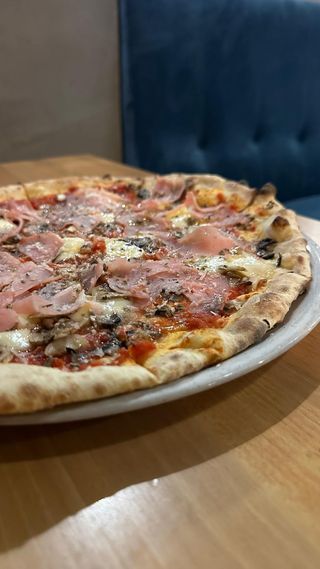 Prosciutto e funghi
