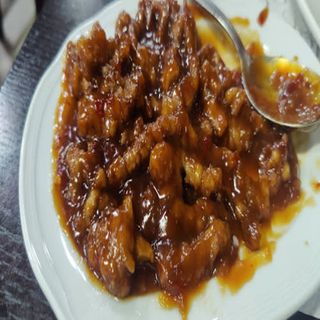 Tiritas De Ternera Frita Con Salsa Dulcipicante