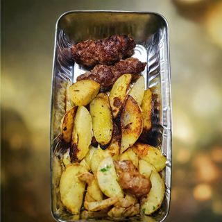 Salsiccia e patate al forno