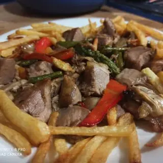 Salteado De Cordero Lechal Con Verduras Naturales (Ración)