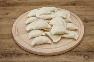 Pierogi z serem cheddar i pieczarkami