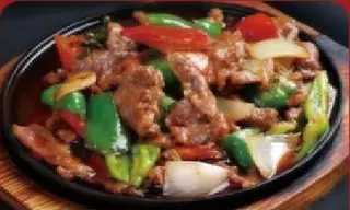 36. Ternera En Plato Caliente