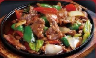 36. Ternera En Plato Caliente