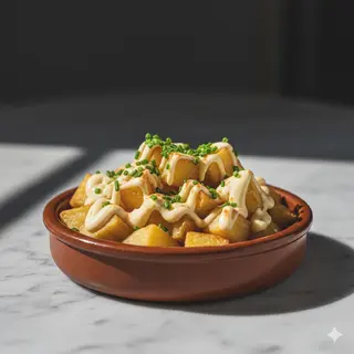 Ración De Patatas Alioli Del Ángel Caído