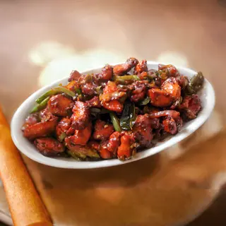 1/4 Chicken Pilipili Sauce Served With Rice or Chapati & Vegetables