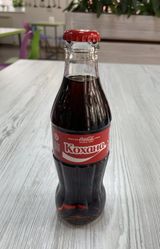 Напій Coca-Cola в склі (0.25 л)
