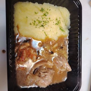 Печен свински джолан със сос от манатарки