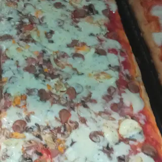 Pizza al taglio condita