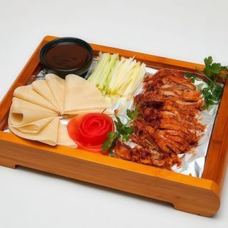 1/2 Pato laqueado estilo Pekín