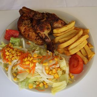 1/2 pollo con patatas y ensalada