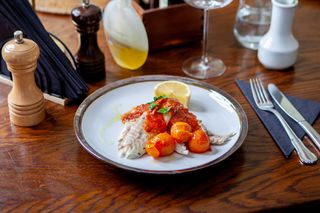 Dorada in sos Sicilian