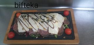 Beefsteak carpaccio with parmesan leaves and pumpkin seeds 200 gr