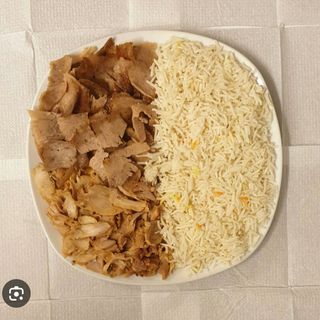 Plato De Arroz Con Carne Mixta