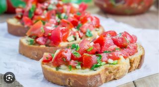 "Bruschette" con Tomate