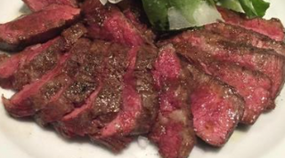 Tagliata di manzo - entrecote con pomodorini, rucola e scaglie di grana