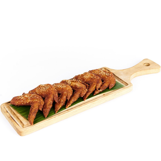 Alitas de pollo crujientes con sésamo y toque picante ( 6pzs.)