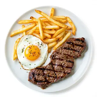 Pluma ibérica, huevos y patatas a lo pobre
