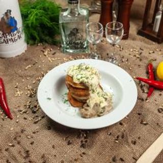 Деруни з куркою та грибами під сиром (340г)