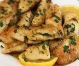 68. Панирано пилешко в лимонов сос (700г)