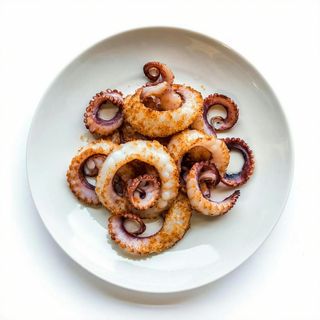 Calamari infarinati e cotti al forno
