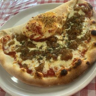 Pizza Feliz Mitad Pizza y Mitad Calzone (30 Cm.)