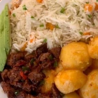 Pan fried Goat -vegetable rice 