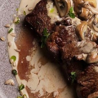 Медальйони з телятини фламбе