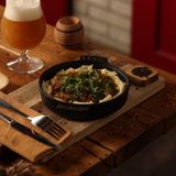 საქონლის ჩაშუშული თაშმიჯაბით კეცზე