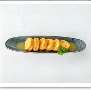 Queso Rulo De Cabra Empanado Y Frito