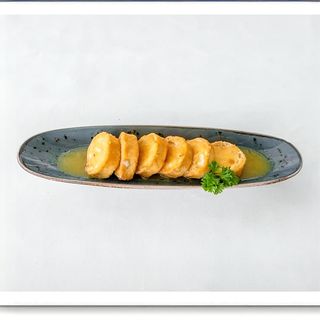 Queso Rulo De Cabra Empanado Y Frito