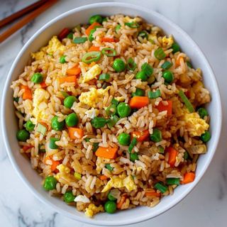 Jollof & Fried Rice with salad and protein