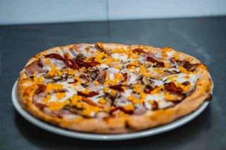 Pizza Rustic Specialitatea Casei mare