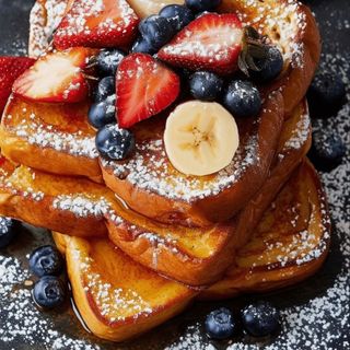 French Toast with a Bowl of Seasonal Fruit.
