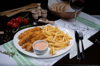 Snitel de pui in fulgi de porumb