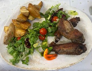 Coaste de porc cu cartofi la cuptor