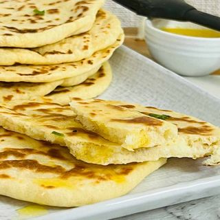 CHEESE NAAN ( BREAD)
