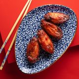 Крильця в гострому соусі