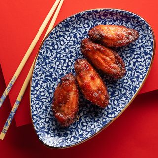 Крильця в гострому соусі